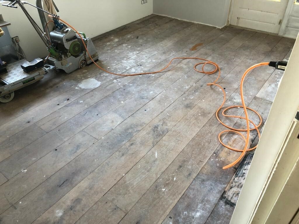 Witte vlekken in houten vloer