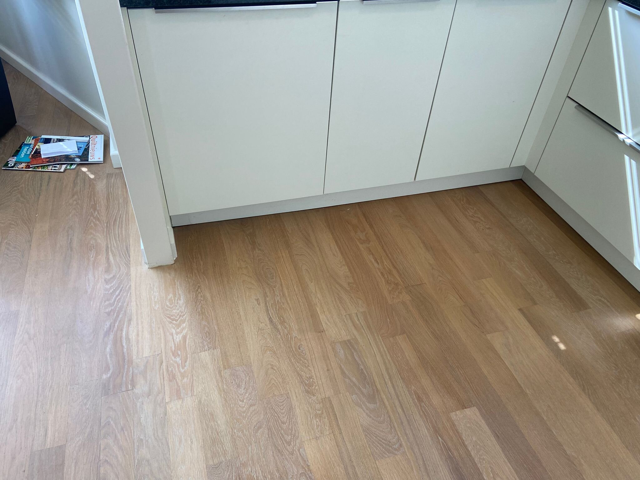Parketrenovatie na waterschade, reparatie, bijleggen, vervangen, kromgetrokken vloerdelen