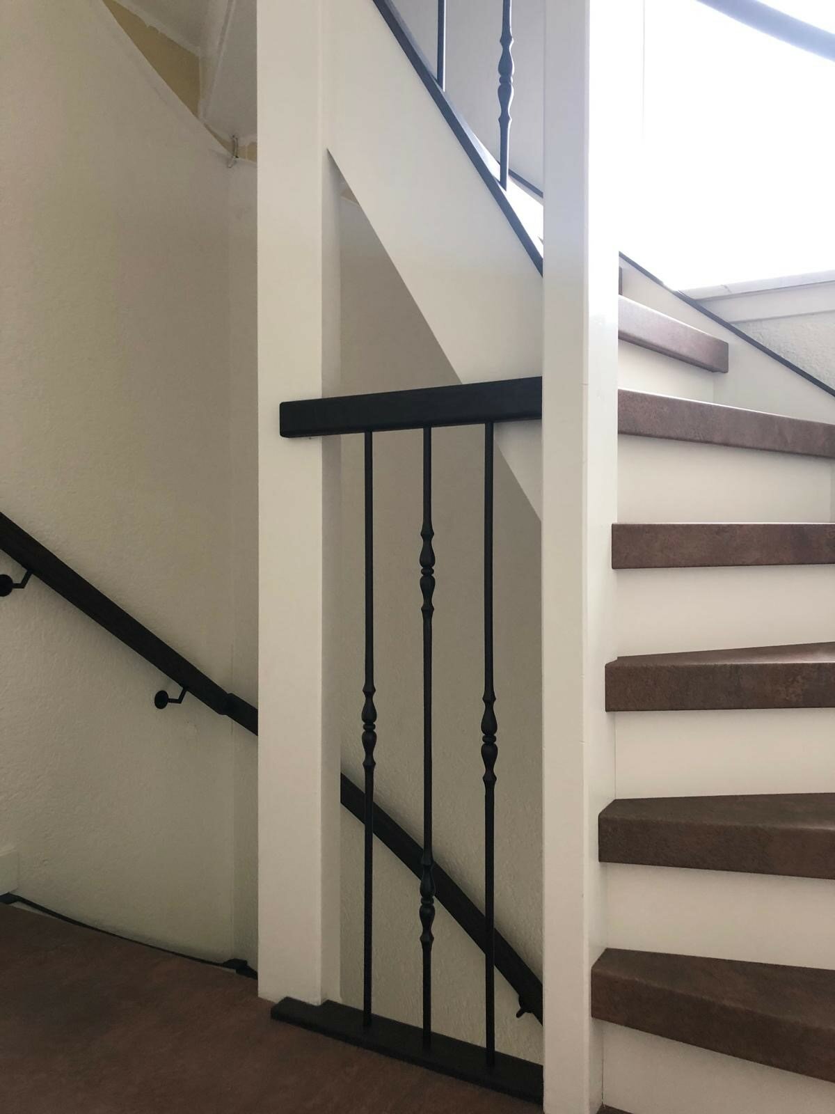 Open trap dichtmaken dichte trap overzettreden betonlook bruin roest cortenstaallook smeedijzer balustrade modern Den Bosch 's-Hertogenbosch Rosmalen Zaltbommel.jpg