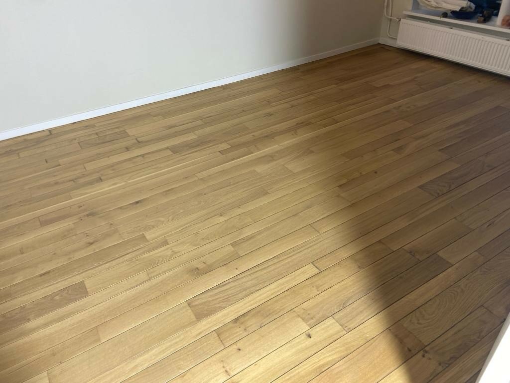 Houten parketvloer schuren en oliën in warme kleur Zaltbommel Breda Den Bosch.jpg