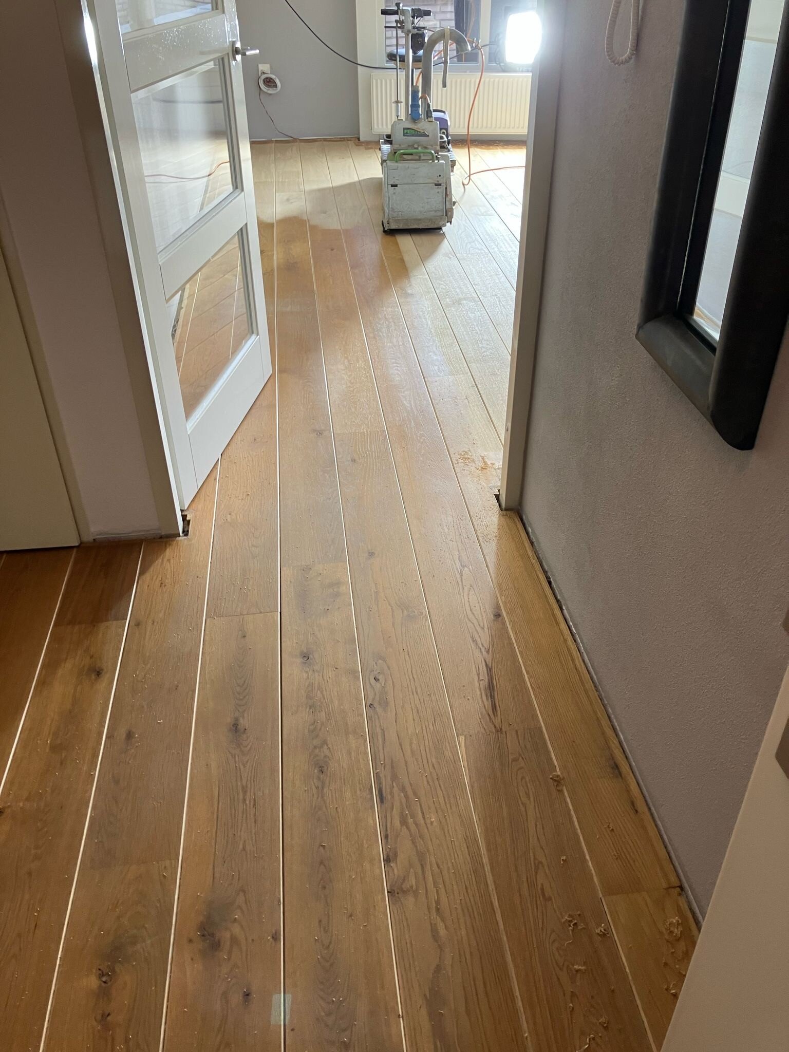 Schuren en oliën van eikenhouten vloer van vergeeld naar vergrijsd mat naturel Den Bosch, 's-Hertogenbosch, Zaltbommel.jpg