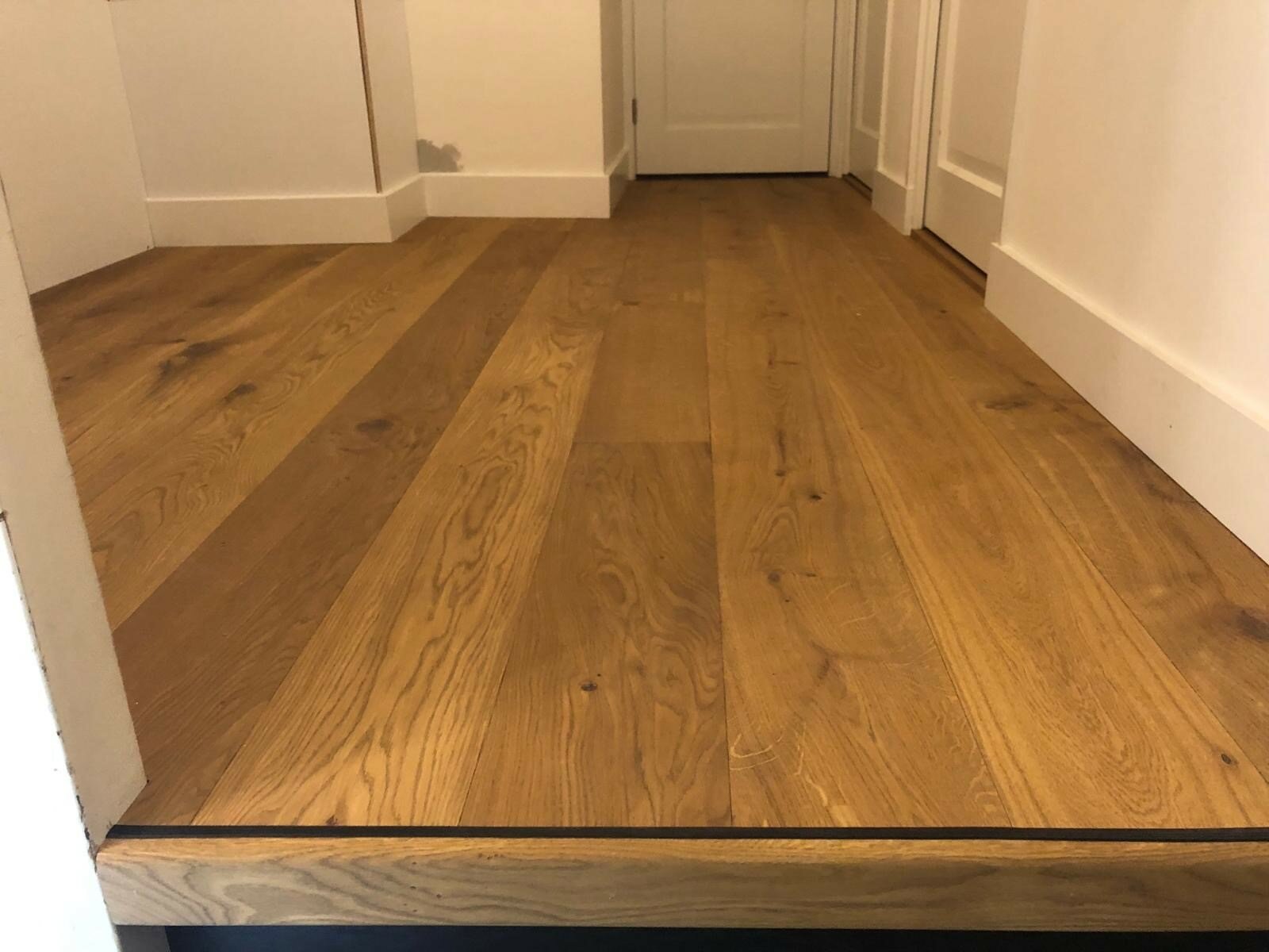 Eiken vloer op overloop hetzelfde als trap Zaltbommel.jpg