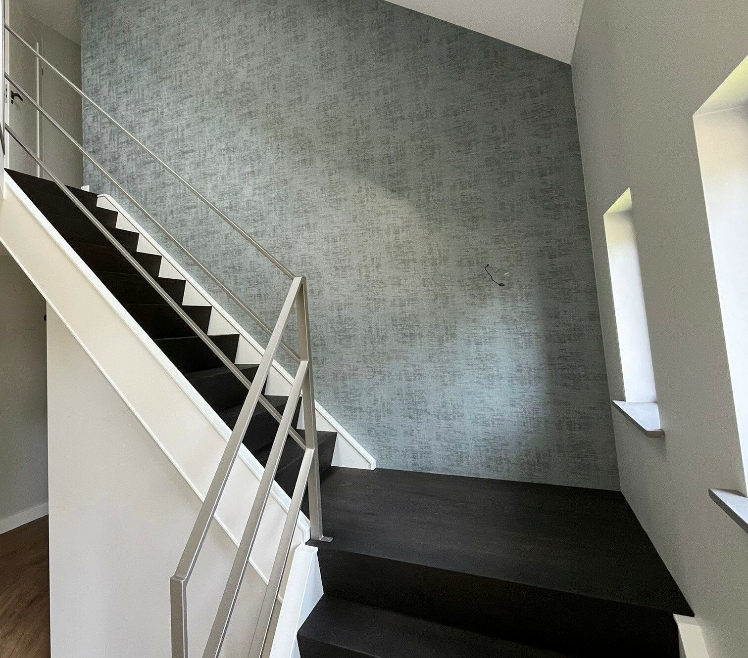 Z-traprenovatie donker in Hedel Den Bosch met RVS balustrade.jpg